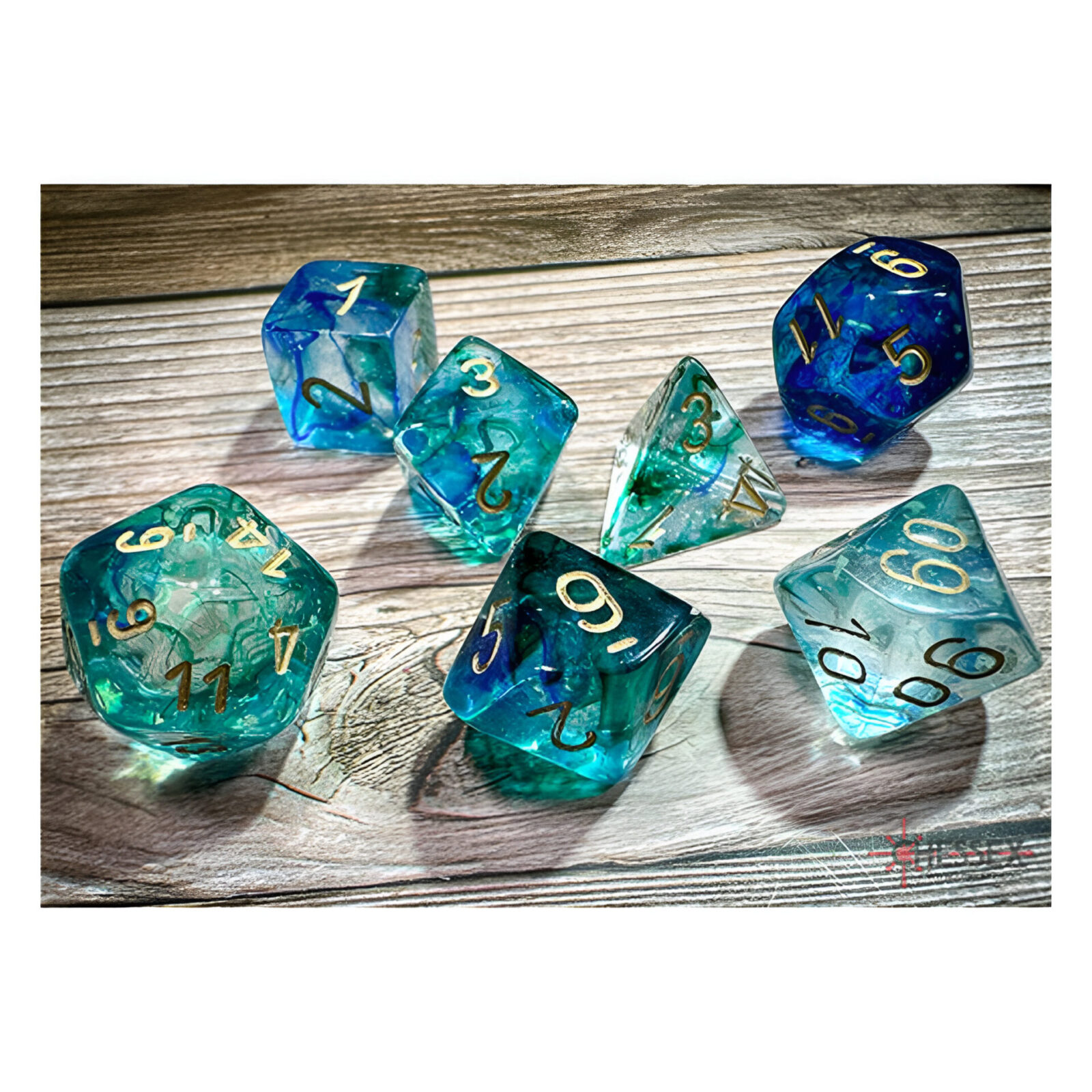 Chessex – Nebula Polyhedral 7 Dice Set – Luminary Oceanic Gold